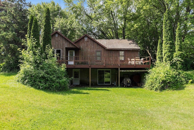 8950 Pine Ln, Fremont, WI 54940 - rear view of property with a deck and a yard