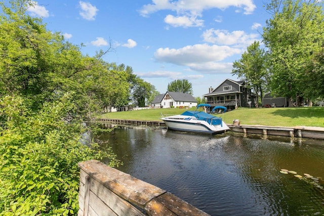8950 Pine Ln, Fremont, WI 54940 - dock with a water view and a yard