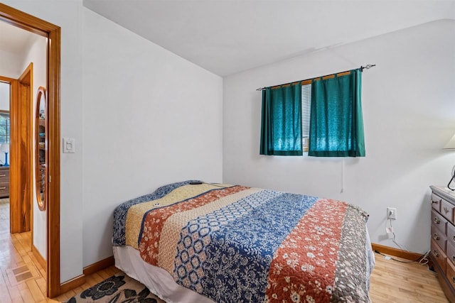 600 Forest Ave, Fond Du Lac, WI 54935 - bedroom featuring wood finished floors and baseboards