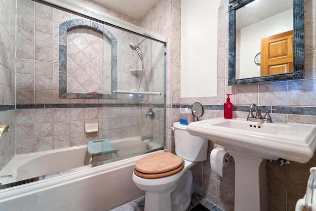 600 Forest Ave, Fond Du Lac, WI 54935 - bathroom with tile walls and shower / bath combination with glass door