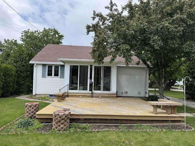 600 Forest Ave, Fond Du Lac, WI 54935 - back of property featuring a wooden deck, a yard, and a shingled roof