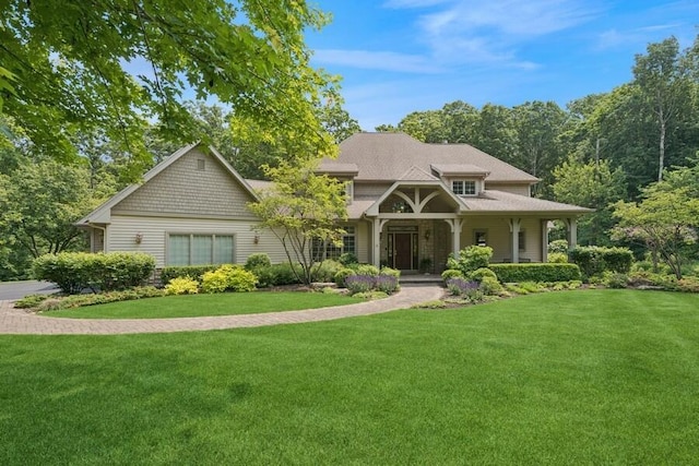 N1760 W Valley Park Rd, Lake Geneva, WI 53147 - view of front of house featuring a front yard and a porch