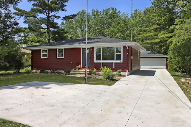 2336 128th St, Pleasant Prairie, WI 53158 - view of front facade featuring an outbuilding, a detached garage, and a front yard