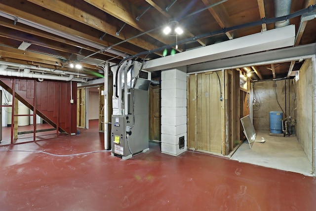 2336 128th St, Pleasant Prairie, WI 53158 - unfinished basement with heating unit, a water pressure tank, and stairs
