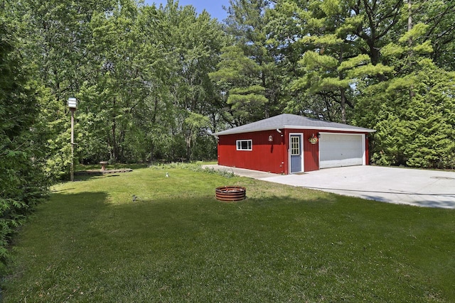 2336 128th St, Pleasant Prairie, WI 53158 - view of grassy yard featuring an outdoor structure and a garage