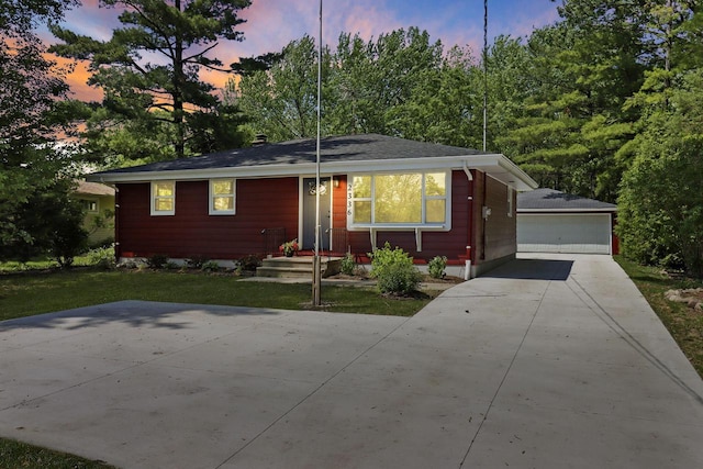 2336 128th St, Pleasant Prairie, WI 53158 - view of front of home with an outbuilding, a detached garage, and a front yard