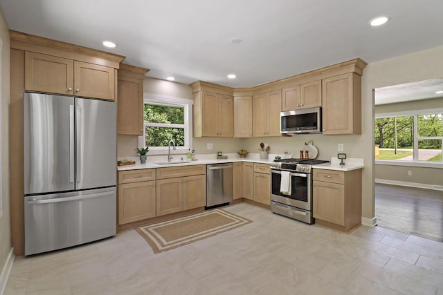 2336 128th St, Pleasant Prairie, WI 53158 - kitchen with stainless steel appliances, light countertops, plenty of natural light, and recessed lighting