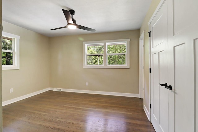 2336 128th St, Pleasant Prairie, WI 53158 - unfurnished bedroom featuring dark wood finished floors and ceiling fan