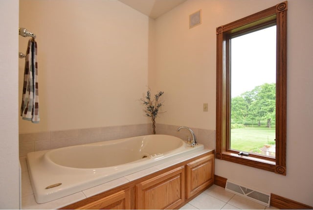 6200 County Road Tt, Marshall, WI 53559 - full bath featuring a garden tub, healthy amount of natural light, and tile patterned floors