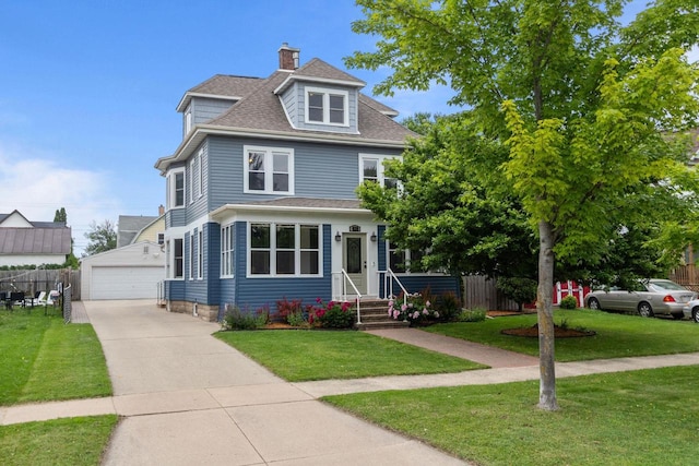 628 Broad St, Menasha, WI 54952 - american foursquare style home with an outbuilding, a chimney, entry steps, a garage, and roof with shingles