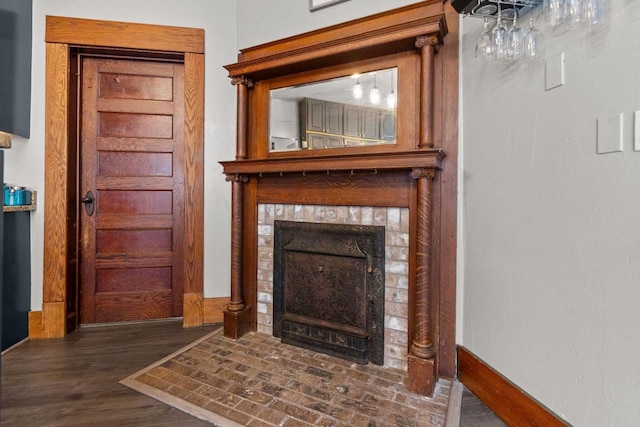 628 Broad St, Menasha, WI 54952 - detailed view of wood finished floors and a fireplace with flush hearth