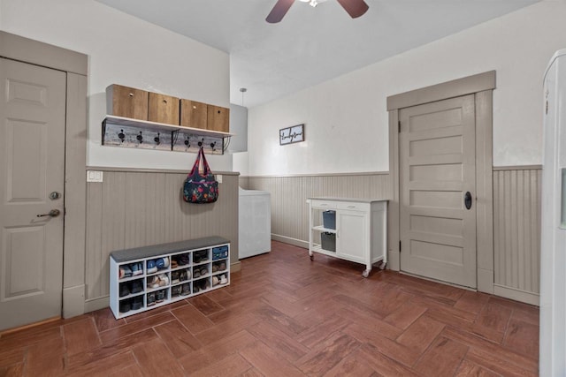 628 Broad St, Menasha, WI 54952 - mudroom with a wainscoted wall, a ceiling fan, and washer / dryer