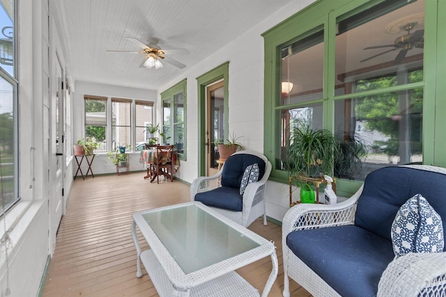628 Broad St, Menasha, WI 54952 - sunroom featuring a ceiling fan