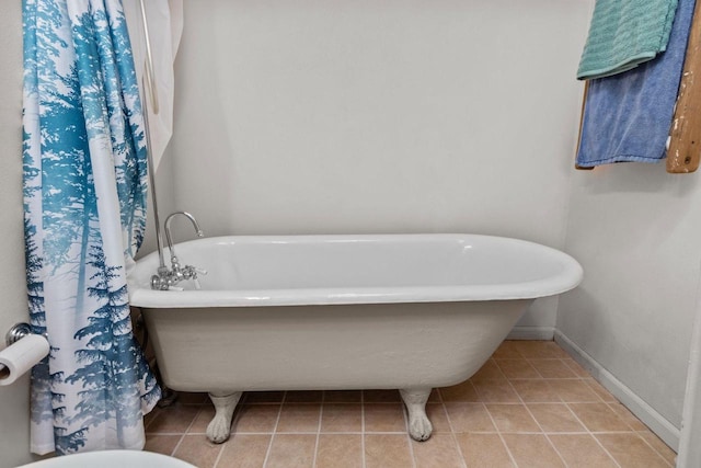 628 Broad St, Menasha, WI 54952 - full bath featuring tile patterned floors and a freestanding bath