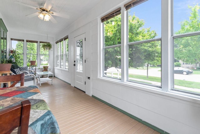 628 Broad St, Menasha, WI 54952 - sunroom / solarium featuring a ceiling fan and wood finished floors