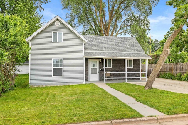 448 Wadleigh St, Stevens Point, WI 54481 - traditional home featuring a porch and roof with shingles