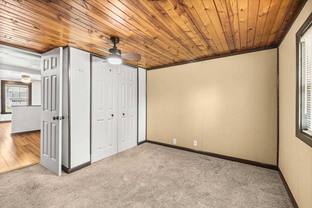 448 Wadleigh St, Stevens Point, WI 54481 - unfurnished bedroom featuring carpet, wooden ceiling, a closet, and a ceiling fan