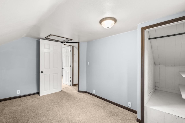 448 Wadleigh St, Stevens Point, WI 54481 - unfurnished bedroom with carpet floors and vaulted ceiling