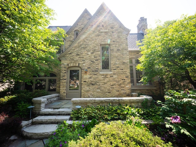 2544 N 91st St, Wauwatosa, WI 53226 - view of front facade featuring a chimney
