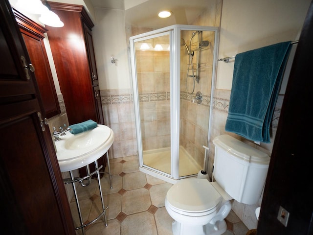 2544 N 91st St, Wauwatosa, WI 53226 - full bath featuring tile walls, a shower stall, and wainscoting