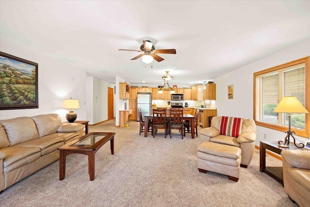 2015-1 S Czech Ct Unit 1201, Arkdale, WI 54613 - living room featuring light carpet and a ceiling fan