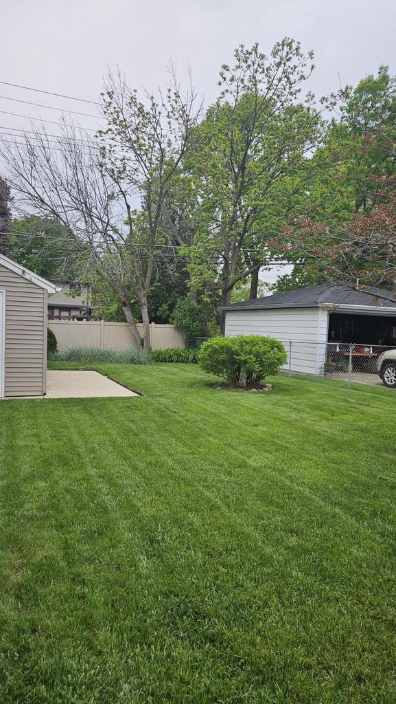 1518 Lathrop Ave, Racine, WI 53405 - view of yard featuring a patio area and an outdoor structure