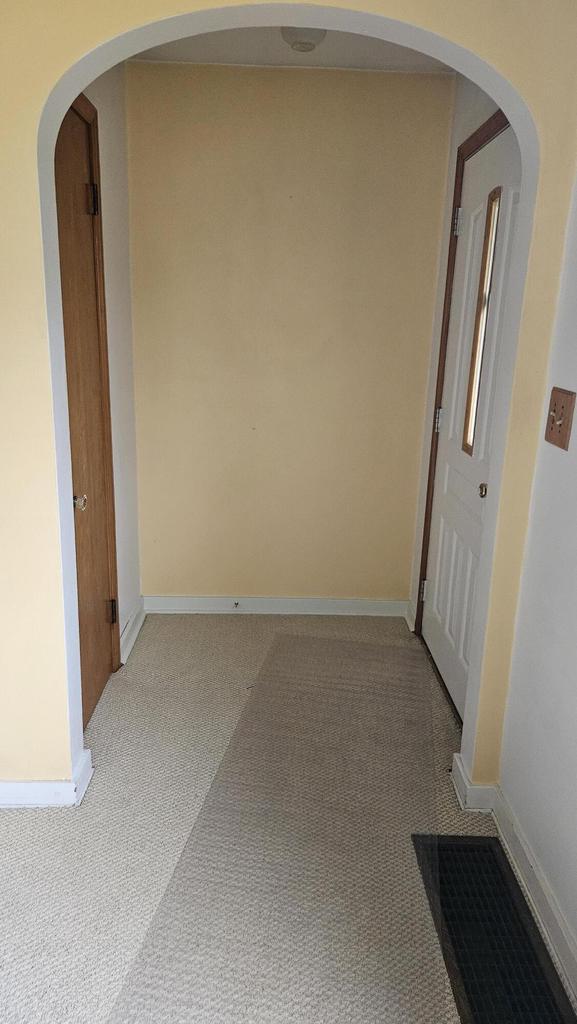 1518 Lathrop Ave, Racine, WI 53405 - hallway featuring light colored carpet and baseboards