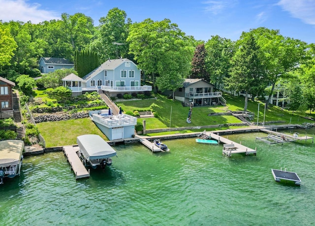W5374 Westshore Dr, Elkhorn, WI 53121 - dock area with boat lift, stairs, and a water view