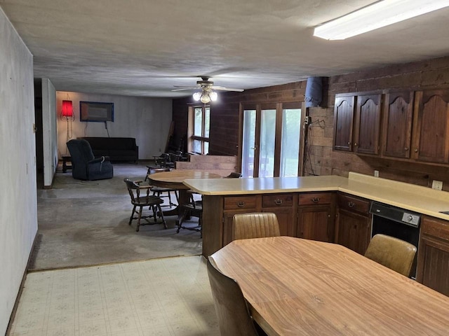 774 Enloe Rd, Rewey, WI 53580 - kitchen with light countertops, a peninsula, dishwasher, and ceiling fan
