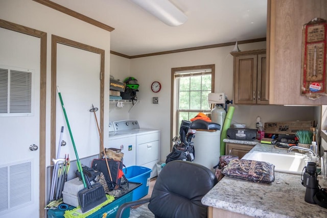 W5671 8th St, Necedah, WI 54646 - laundry area featuring washer and dryer, a heating unit, and crown molding