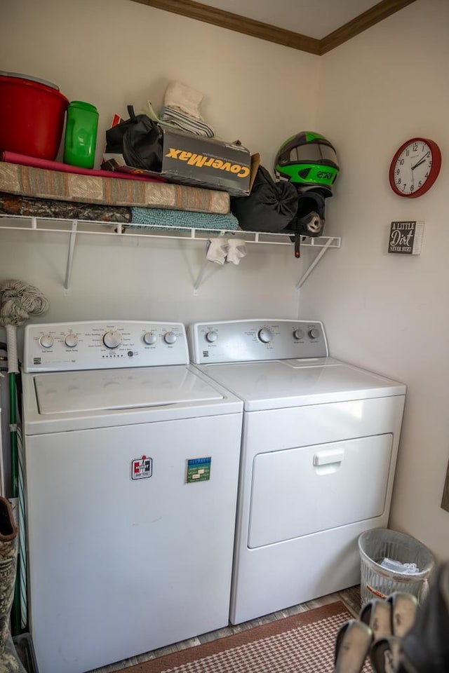 W5671 8th St, Necedah, WI 54646 - laundry room featuring ornamental molding and washing machine and clothes dryer