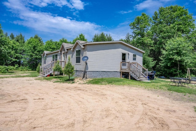 W5671 8th St, Necedah, WI 54646 - view of home's exterior featuring crawl space