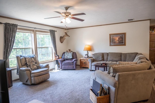W5671 8th St, Necedah, WI 54646 - carpeted living area featuring a ceiling fan, plenty of natural light, and ornamental molding