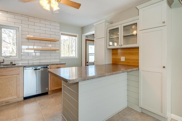 6592 Whalen Rd, Verona, WI 53593 - kitchen with dishwasher, a ceiling fan, a peninsula, glass insert cabinets, and open shelves