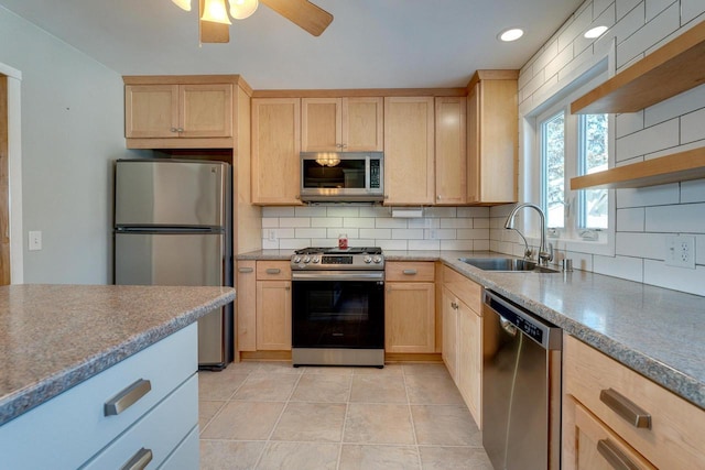 6592 Whalen Rd, Verona, WI 53593 - kitchen featuring stainless steel appliances, light brown cabinetry, backsplash, and recessed lighting