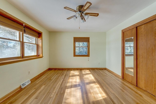 6592 Whalen Rd, Verona, WI 53593 - empty room with plenty of natural light, ceiling fan, and light wood-type flooring