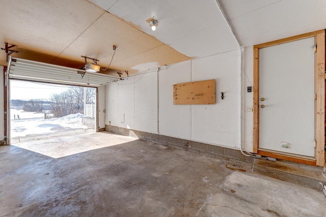 6592 Whalen Rd, Verona, WI 53593 - garage featuring a garage door opener