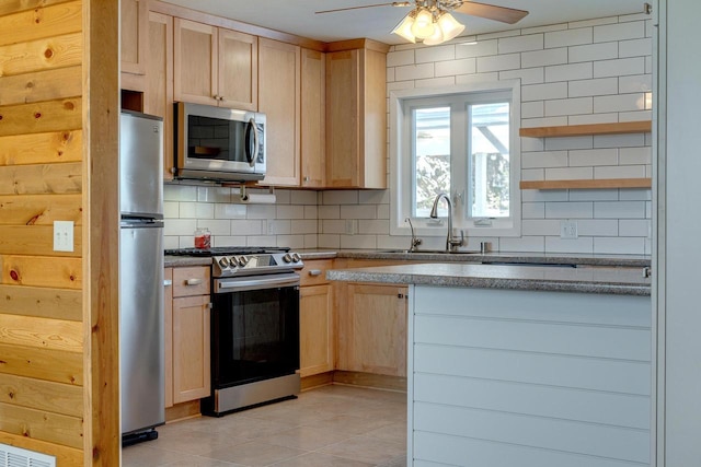 6592 Whalen Rd, Verona, WI 53593 - kitchen featuring stainless steel appliances, light brown cabinetry, backsplash, and ceiling fan