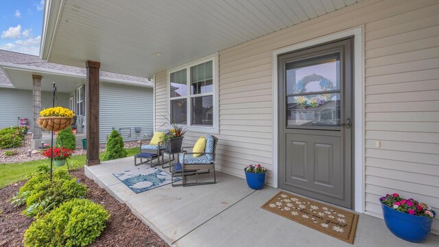 2824 Granite Ct, Sheboygan, WI 53081 - doorway to property with covered porch