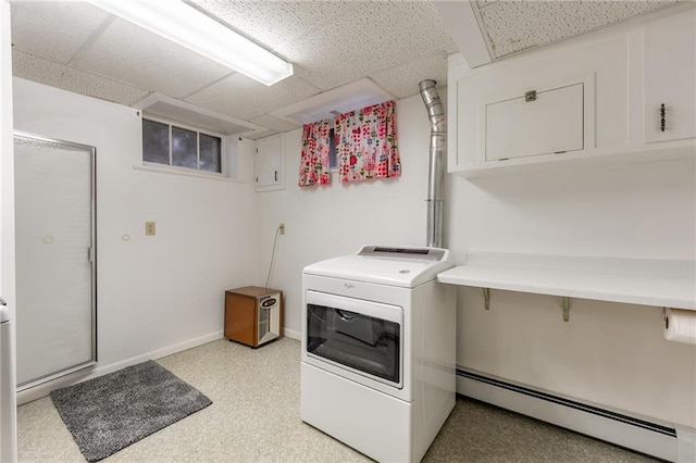 225 W Elm St, Chippewa Falls, WI 54729 - laundry room with washer / dryer, a baseboard heating unit, light floors, and cabinet space