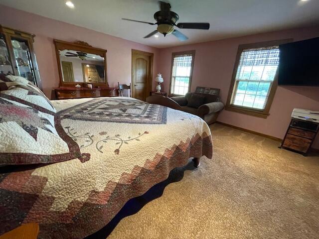23826 18th St, Union Grove, WI 53182 - carpeted bedroom with a ceiling fan and recessed lighting