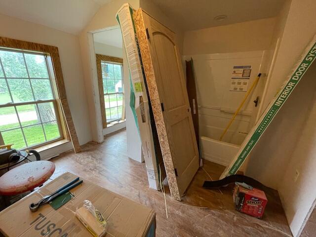 23826 18th St, Union Grove, WI 53182 - bathroom featuring healthy amount of natural light and vaulted ceiling