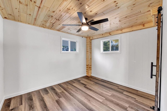 W9173 W 10th Rd, Pound, WI 54161 - empty room featuring wood ceiling, wood finished floors, and ceiling fan