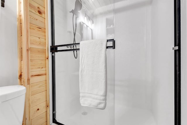 W9173 W 10th Rd, Pound, WI 54161 - full bathroom featuring a stall shower and toilet