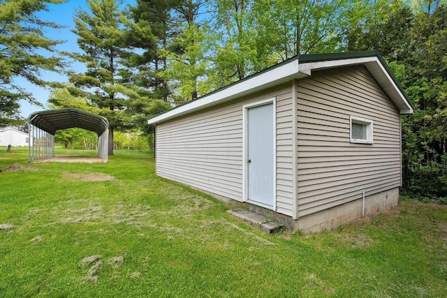 W9173 W 10th Rd, Pound, WI 54161 - view of outbuilding featuring a carport