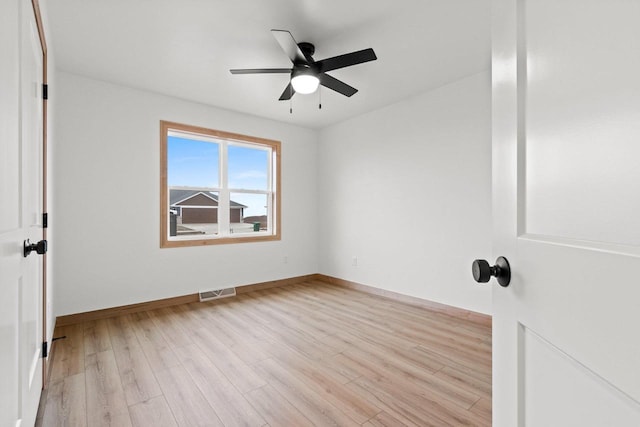 399 Battery Ave, De Pere, WI 54115 - unfurnished bedroom with light wood finished floors and ceiling fan