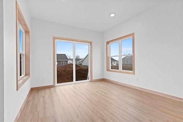 399 Battery Ave, De Pere, WI 54115 - empty room with light wood finished floors and recessed lighting