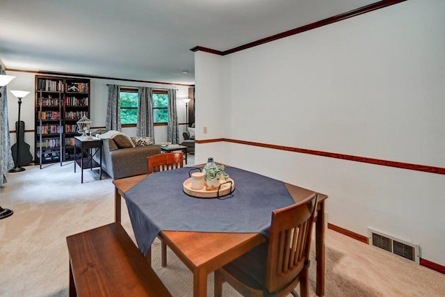 3590 Sabaka Trl, Verona, WI 53593 - dining area featuring carpet and crown molding