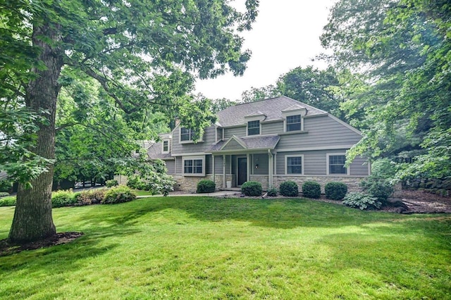 3590 Sabaka Trl, Verona, WI 53593 - view of front of house featuring stone siding and a front yard