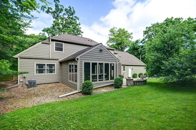 3590 Sabaka Trl, Verona, WI 53593 - rear view of property featuring a yard and roof with shingles